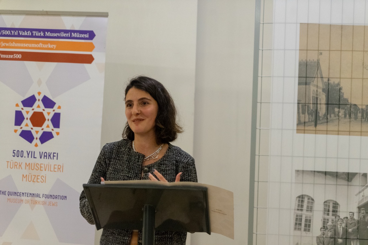 Liza Cemel giving remarks at the exhibition
